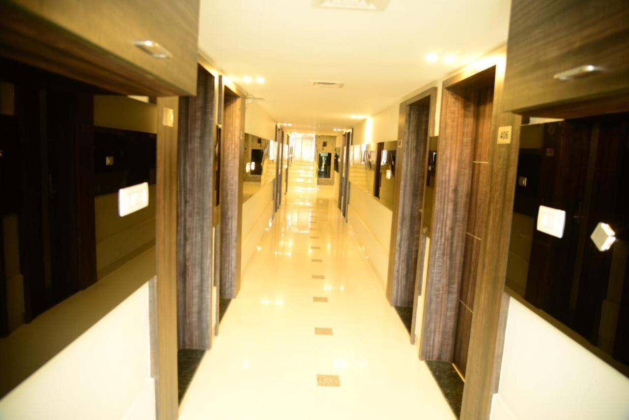 Miles Inn Hotel Hassan Buitenkant foto