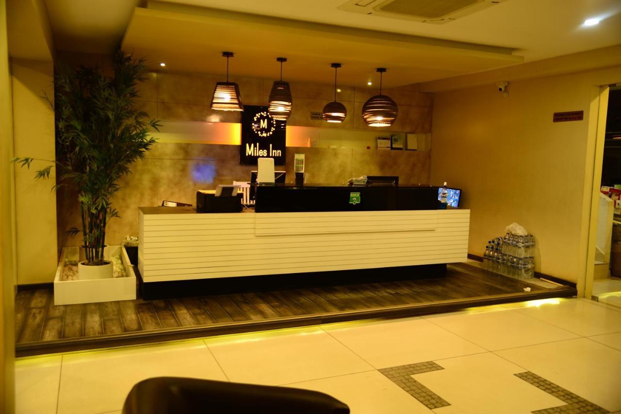 Miles Inn Hotel Hassan Buitenkant foto