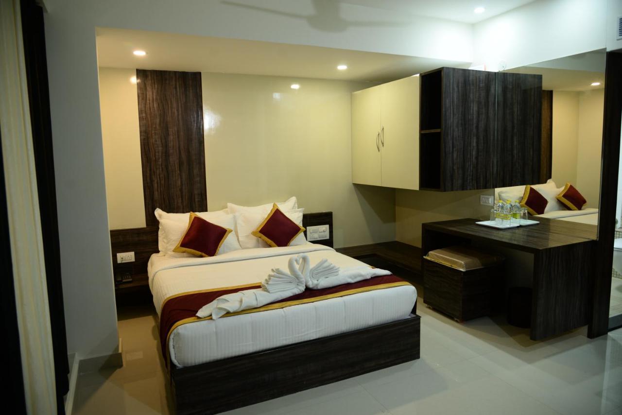 Miles Inn Hotel Hassan Buitenkant foto